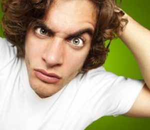 man with questions about chiropractic treatment